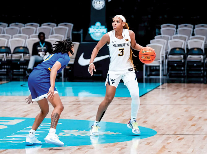 Cooke helps No. 21 WVU women top McNeese State